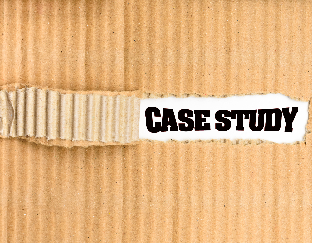 A piece of cardboard with a rip, and under the rip it says "Case Study"